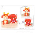 Bright red festive fuwa plush toy